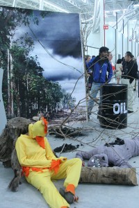 An elaborate action for Canada's fossil - dead birds, oil barrel, and all.